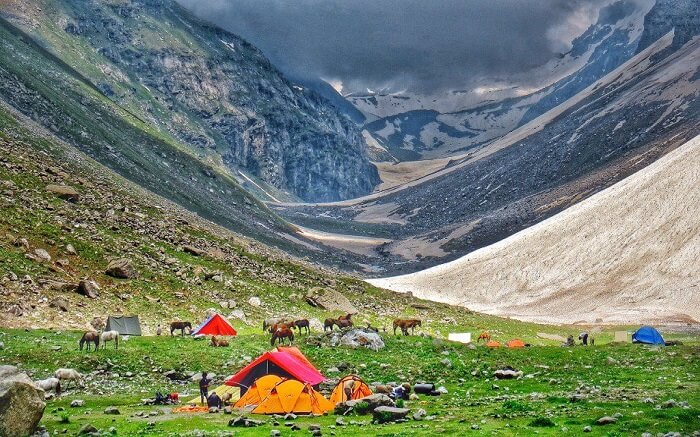 A view of the wonderful campsite at Hampta Pass with mountains in the backdrop ss28102017